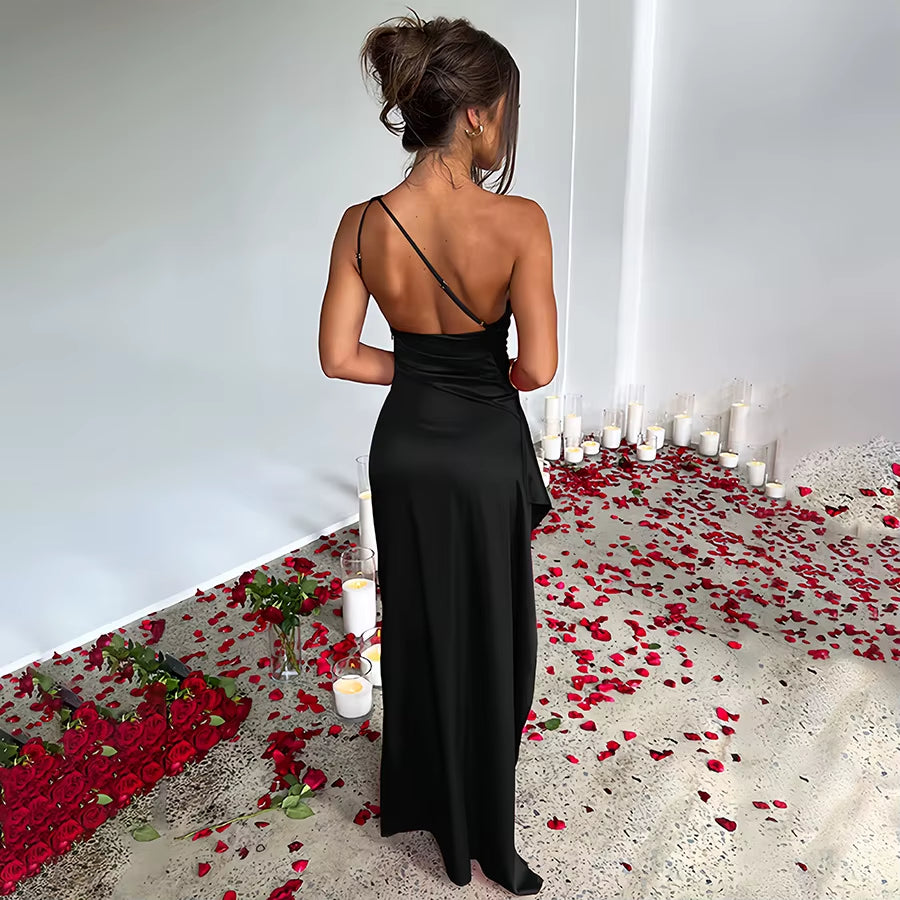 Exude timeless sophistication in this one-shoulder satin gown, designed for summer soirées and evening elegance. Featuring a sleeveless silhouette, daring high slit, and alluring backless detail, this dress is the epitome of graceful allure—perfect for cocktail parties, formal gatherings, or any occasion where elegance is essential