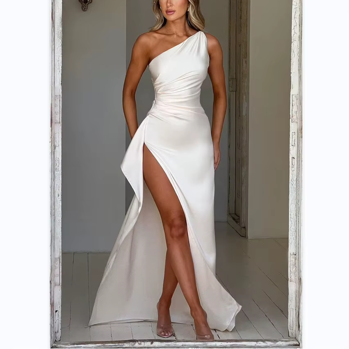 Exude timeless sophistication in this one-shoulder satin gown, designed for summer soirées and evening elegance. Featuring a sleeveless silhouette, daring high slit, and alluring backless detail, this dress is the epitome of graceful allure—perfect for cocktail parties, formal gatherings, or any occasion where elegance is essential