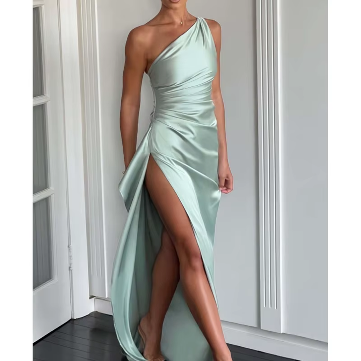 Exude timeless sophistication in this one-shoulder satin gown, designed for summer soirées and evening elegance. Featuring a sleeveless silhouette, daring high slit, and alluring backless detail, this dress is the epitome of graceful allure—perfect for cocktail parties, formal gatherings, or any occasion where elegance is essential